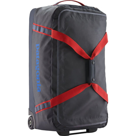 Patagonia Black Hole Wheeled Duffel 70l Smldr blu w/amta red